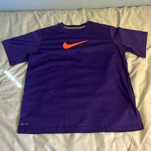 Purple Nike DRI-FIT shirt